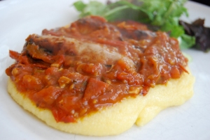 Sausage and tomato stew with polenta 